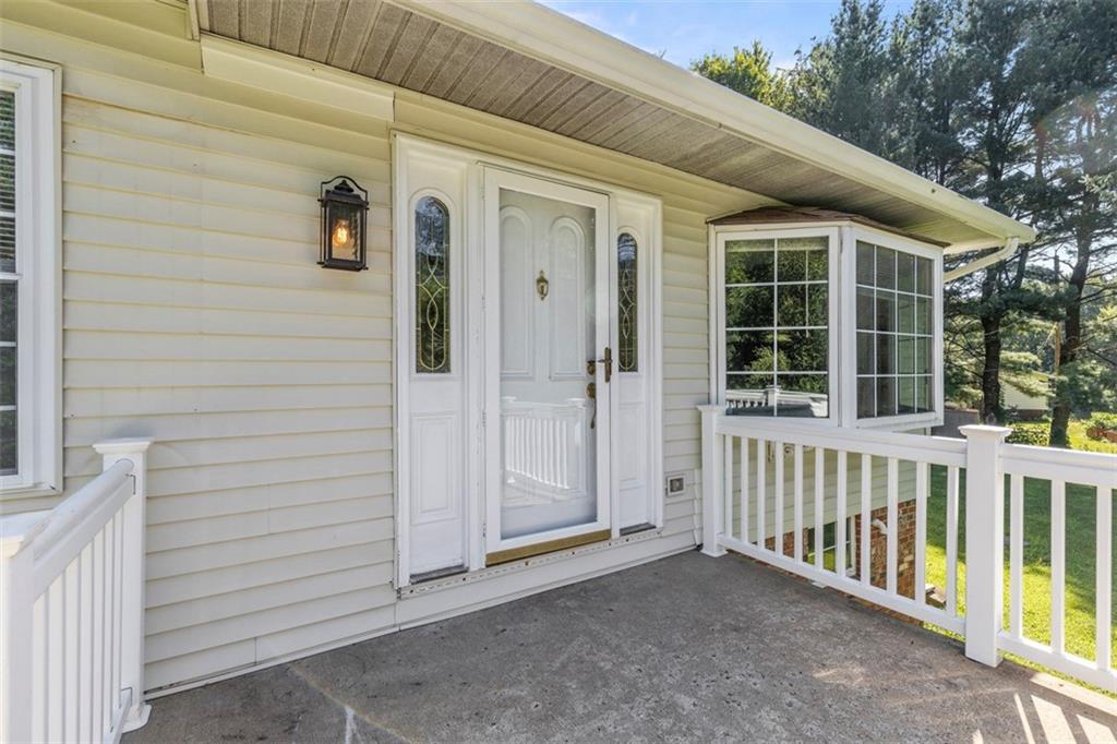 366 Claytonia Road Slippery Rock, PA 16057 - Photo 4 of 38 a view of a porch with a table and chairs