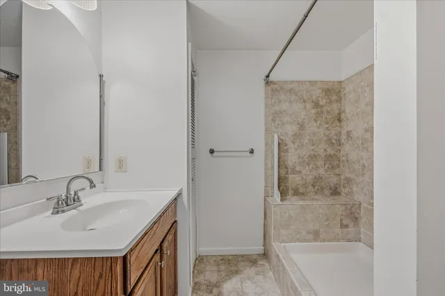 a bathroom with a sink and a tub