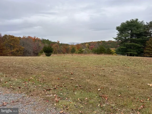 a view of mountain with lake view