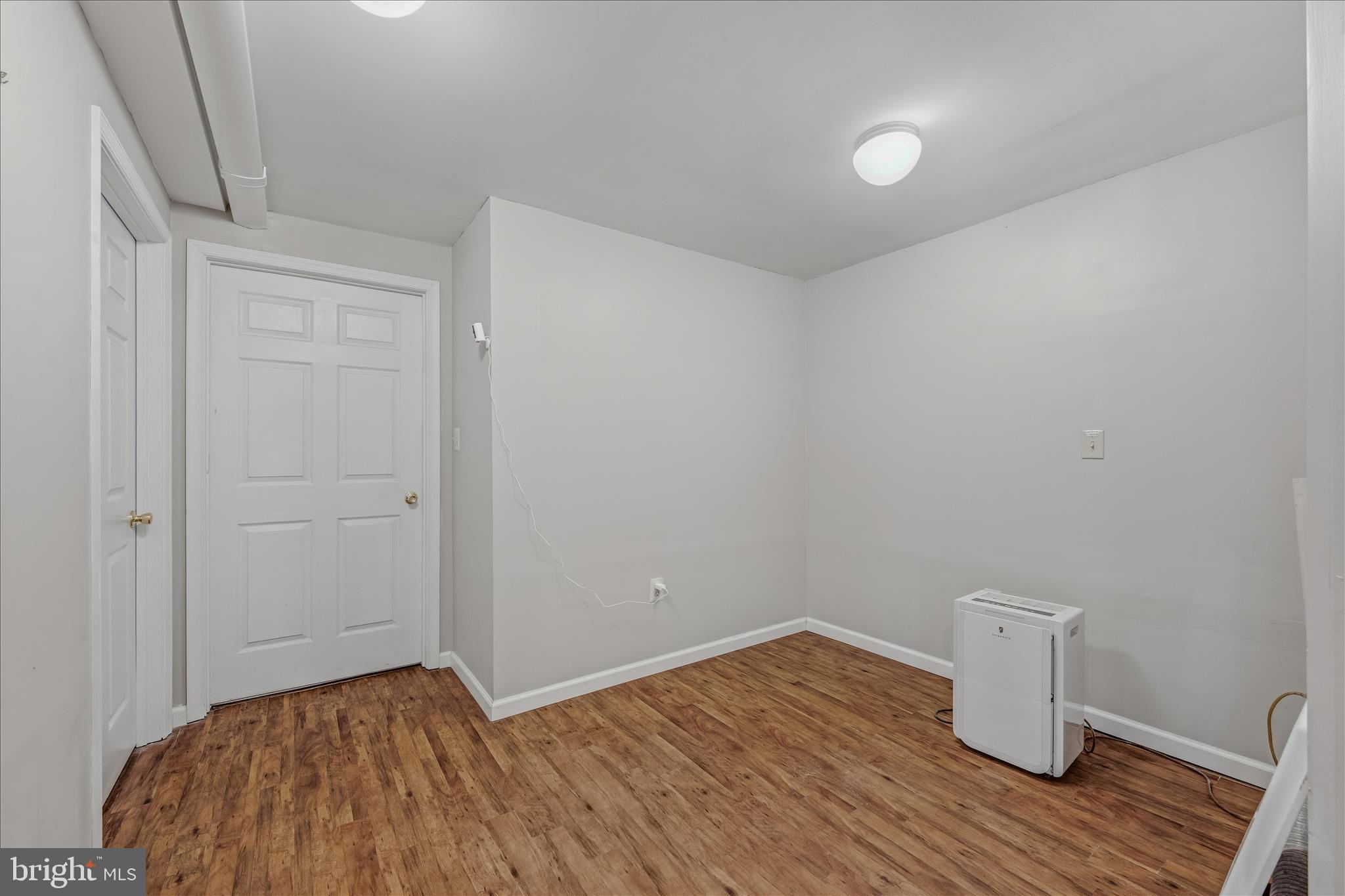 2289 Potomac Road Berkeley Springs, WV 25411 - Photo 8 of 15 a view of room with wooden floor