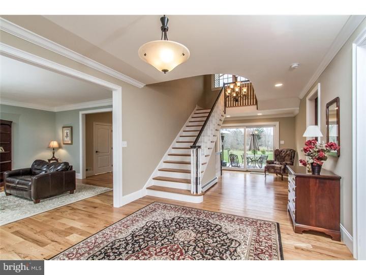 310 West Sandy Ridge Road Doylestown, PA 18901 - Photo 3 of 24 a living room with furniture and a wooden floor