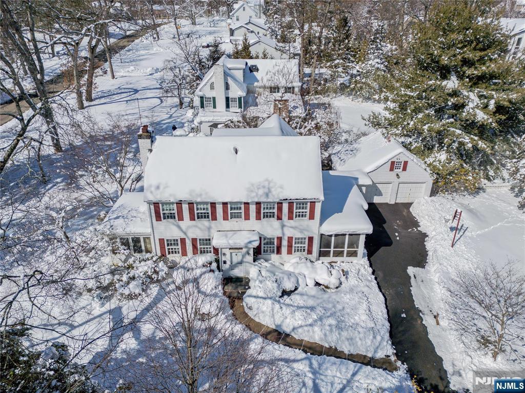 76 Forest Road Tenafly, NJ 07670 - Photo 30 of 32 an aerial view of a house with table and chairs