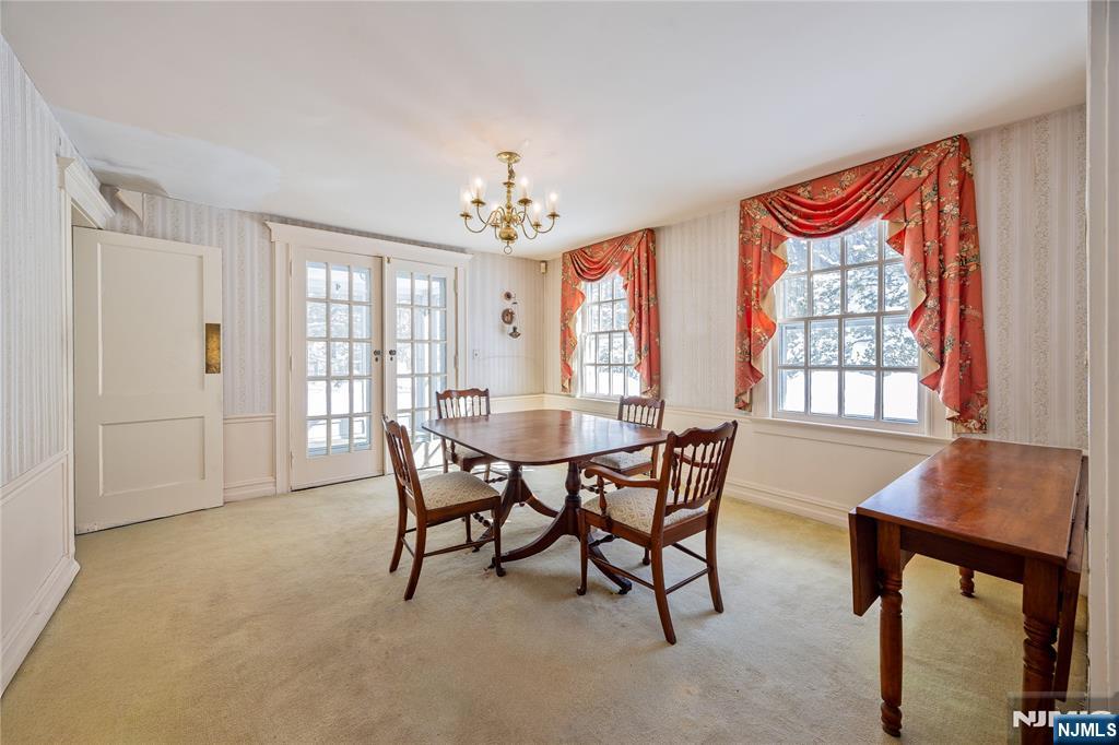 76 Forest Road Tenafly, NJ 07670 - Photo 9 of 32 a view of a dining room with furniture window and outside view