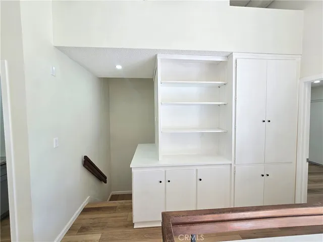 a view of a hallway with closet