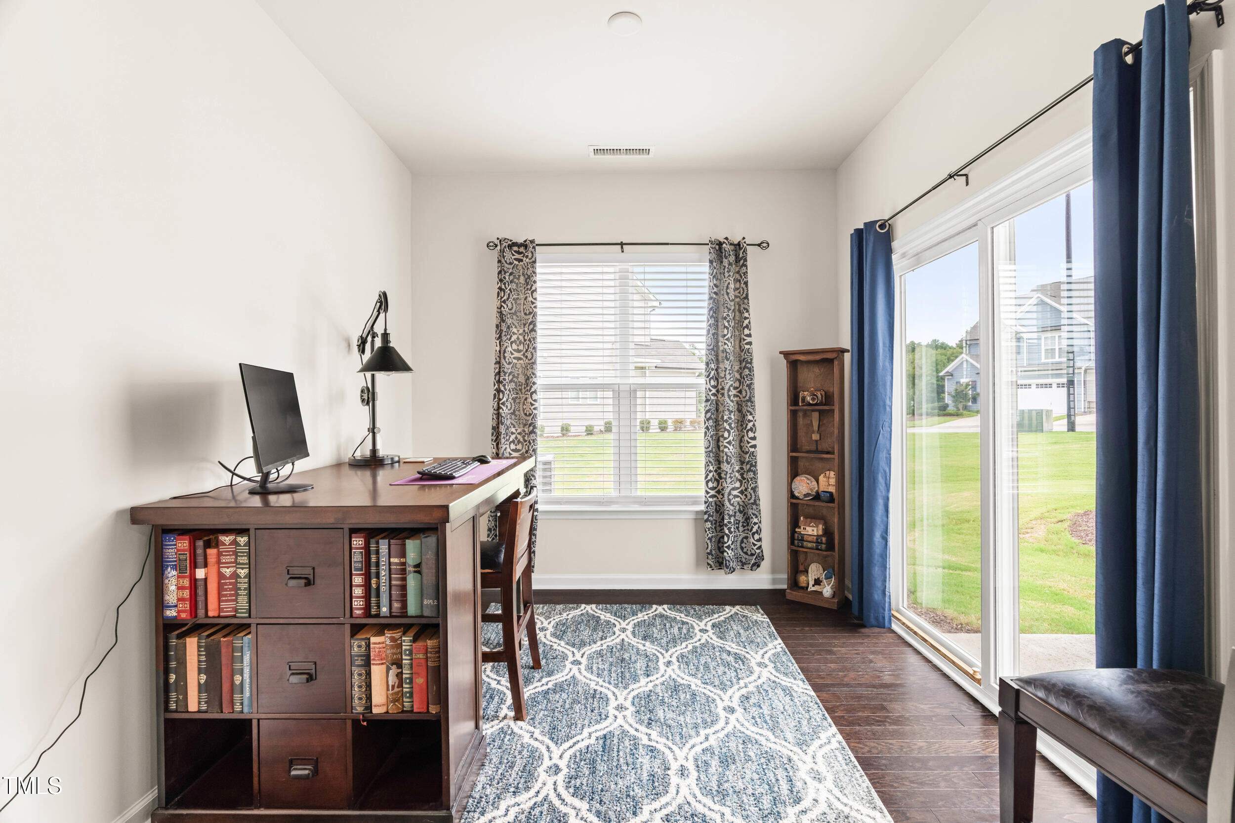 113 Lafferty Street Durham, NC 27560 - Photo 26 of 50 a view of workspace with wooden floor windows