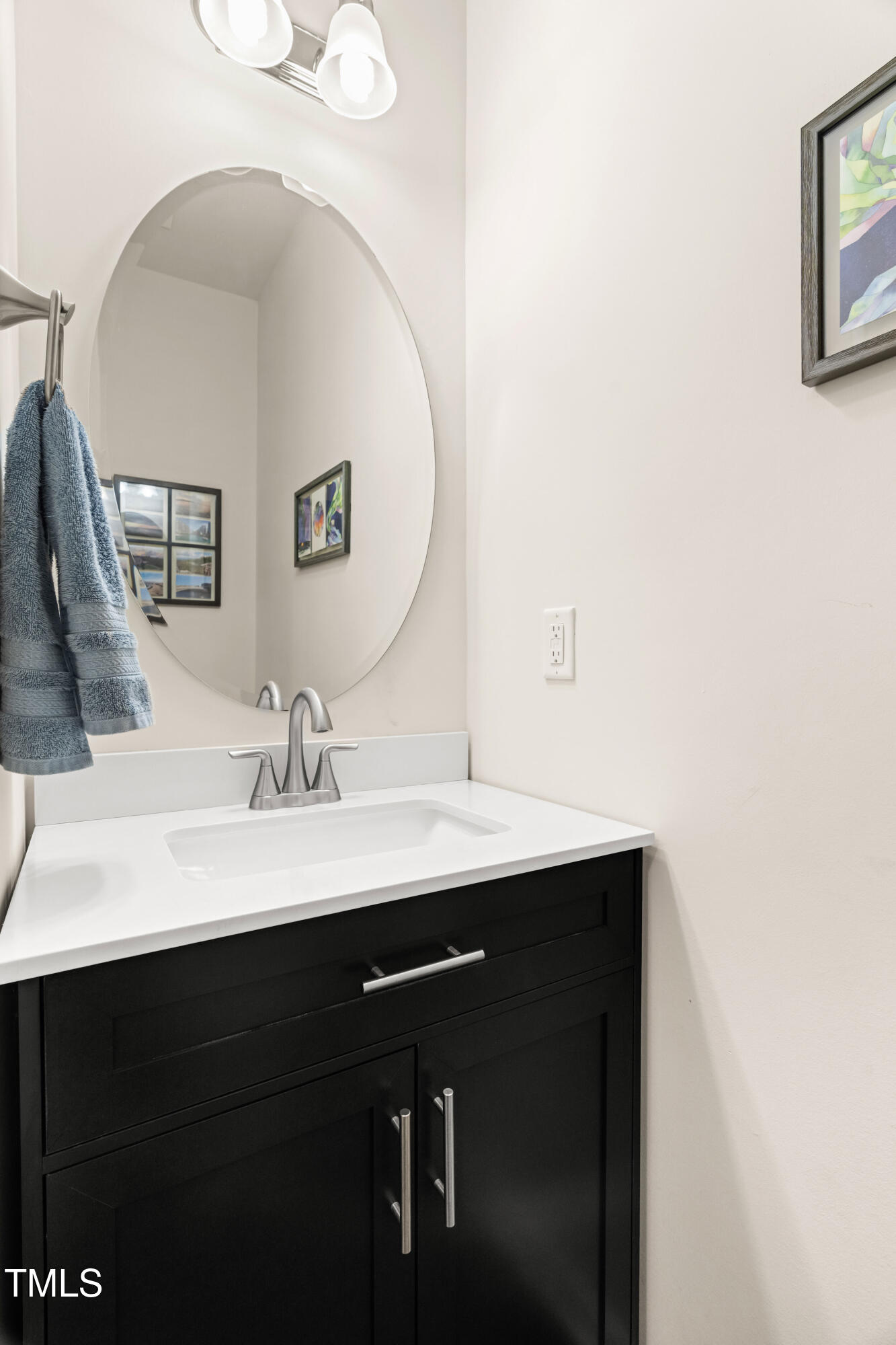 113 Lafferty Street Durham, NC 27560 - Photo 29 of 50 a bathroom with a sink and a mirror
