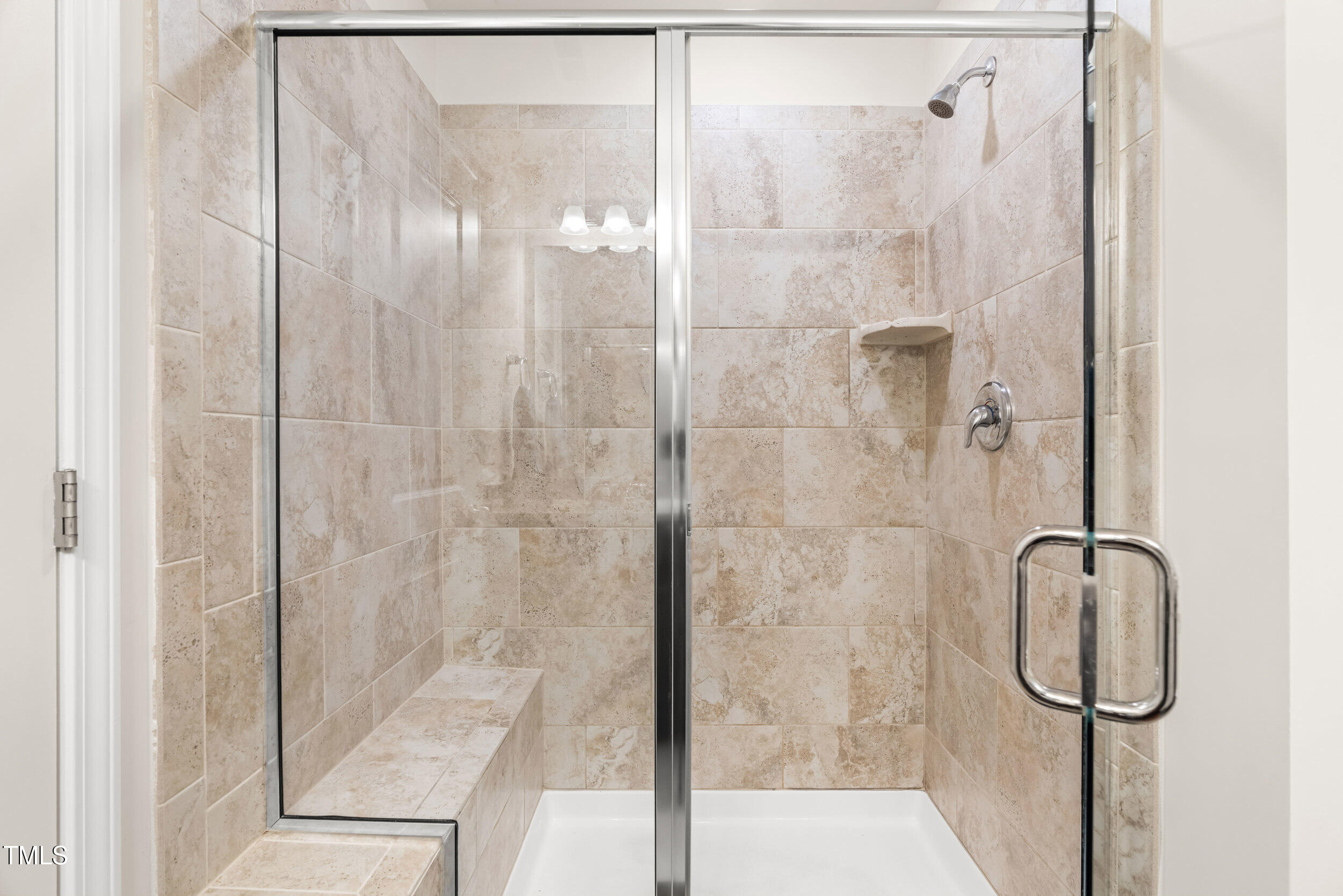 113 Lafferty Street Durham, NC 27560 - Photo 33 of 50 a bathroom with a glass shower door