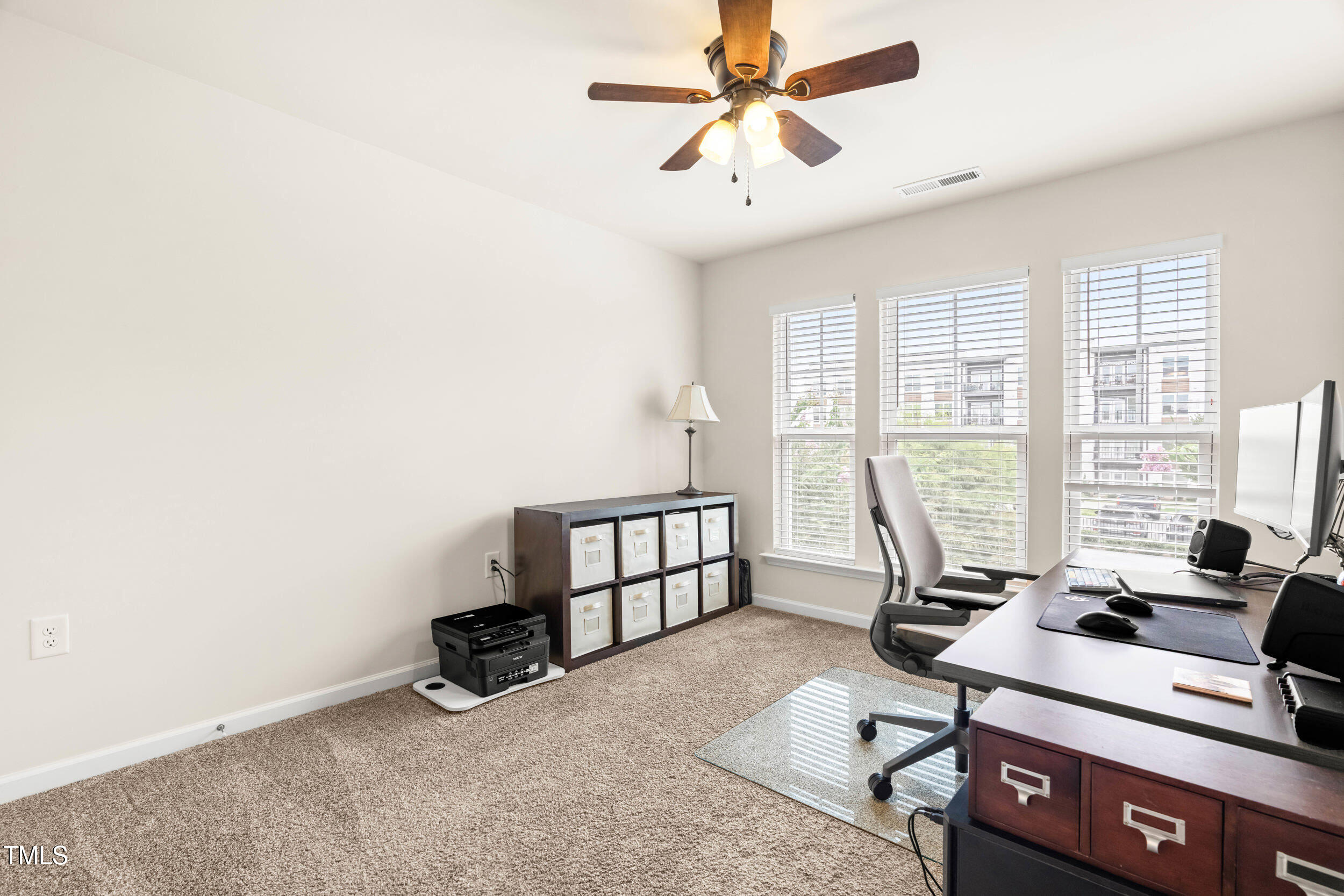 113 Lafferty Street Durham, NC 27560 - Photo 37 of 50 a room with gym equipment and a window