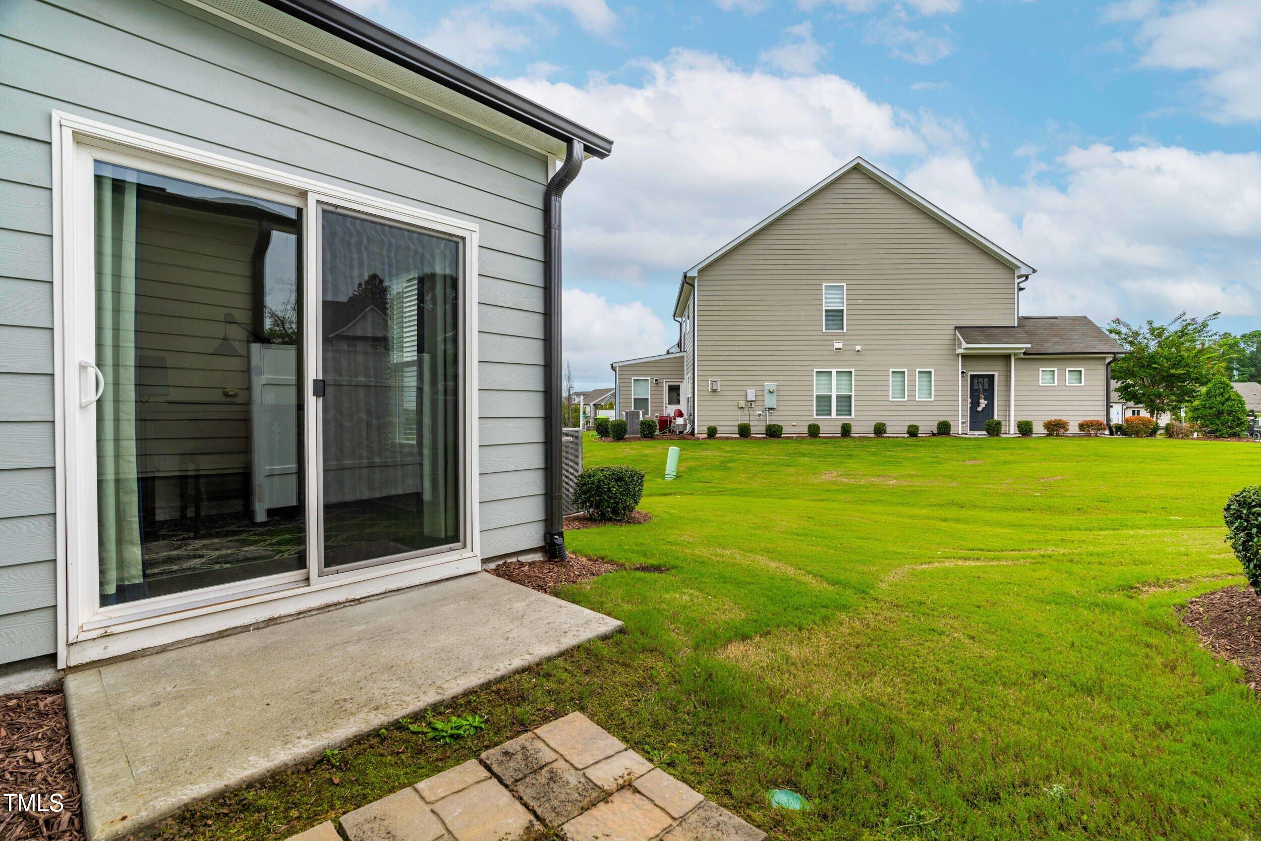 113 Lafferty Street Durham, NC 27560 - Photo 41 of 50 a view of a house with backyard