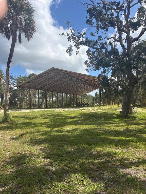 3217 Shine Lane Spring Hill, FL 34607 - Photo 14 of 19 a view of a large trees with a big yard