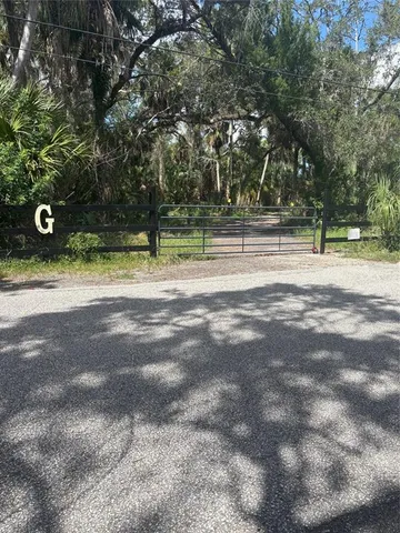 a view of a lake from a yard