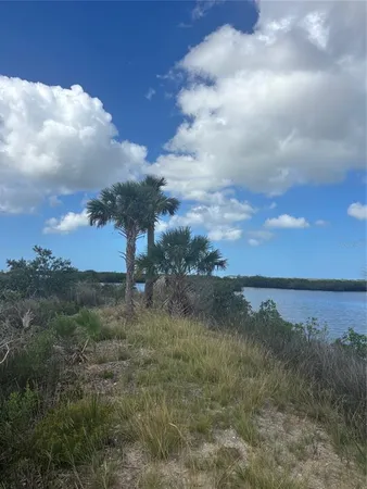 a view of mountain with lake view