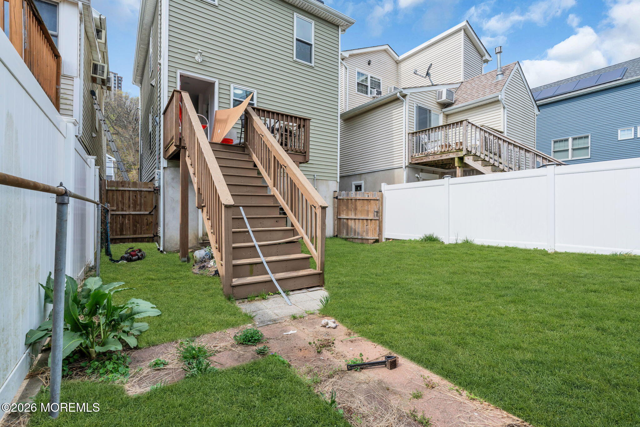 13 Locust Street Highlands, NJ 07732 - Photo 22 of 42 a view of a house with a yard
