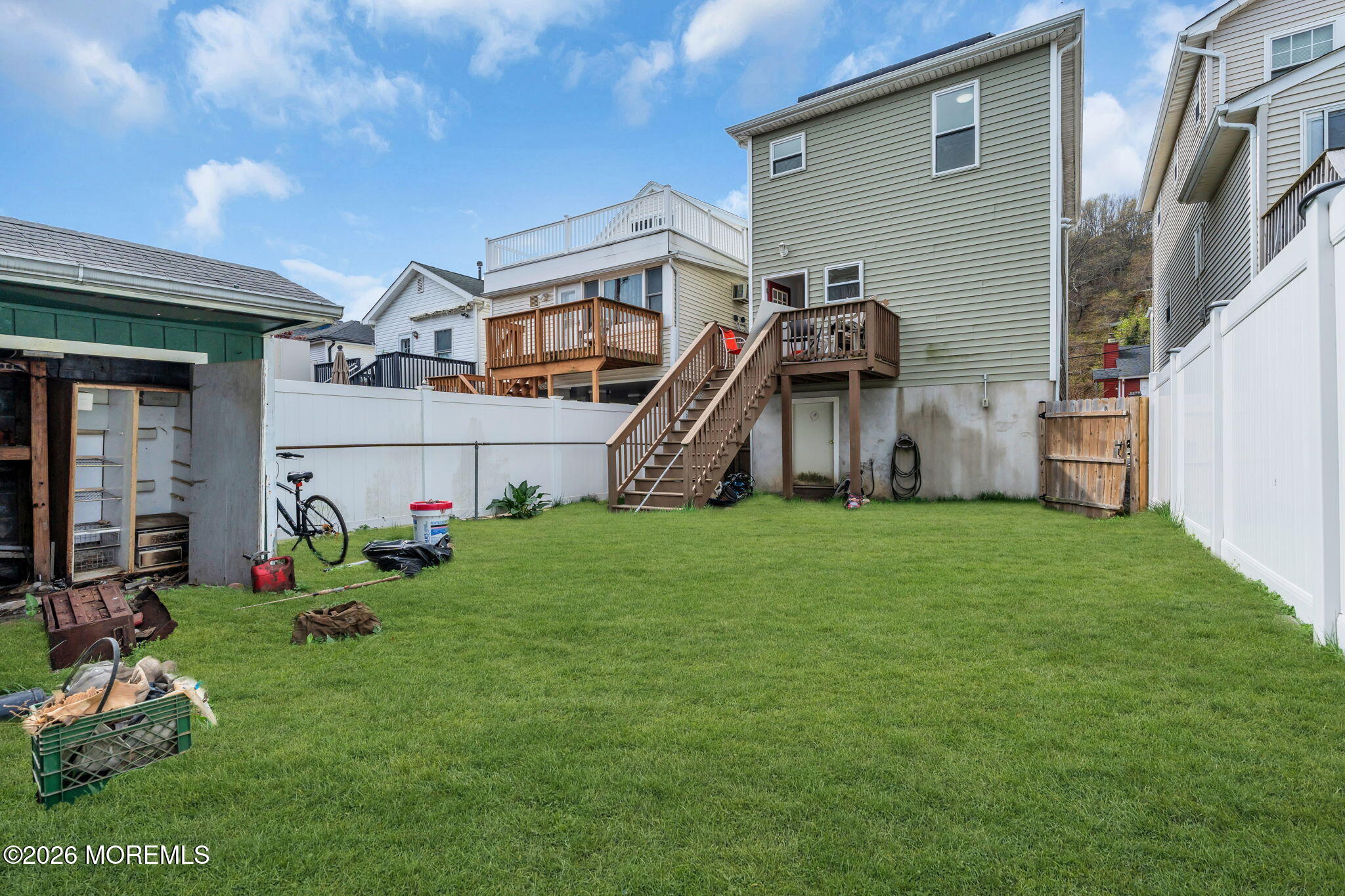 13 Locust Street Highlands, NJ 07732 - Photo 23 of 42 a front view of a house with garden