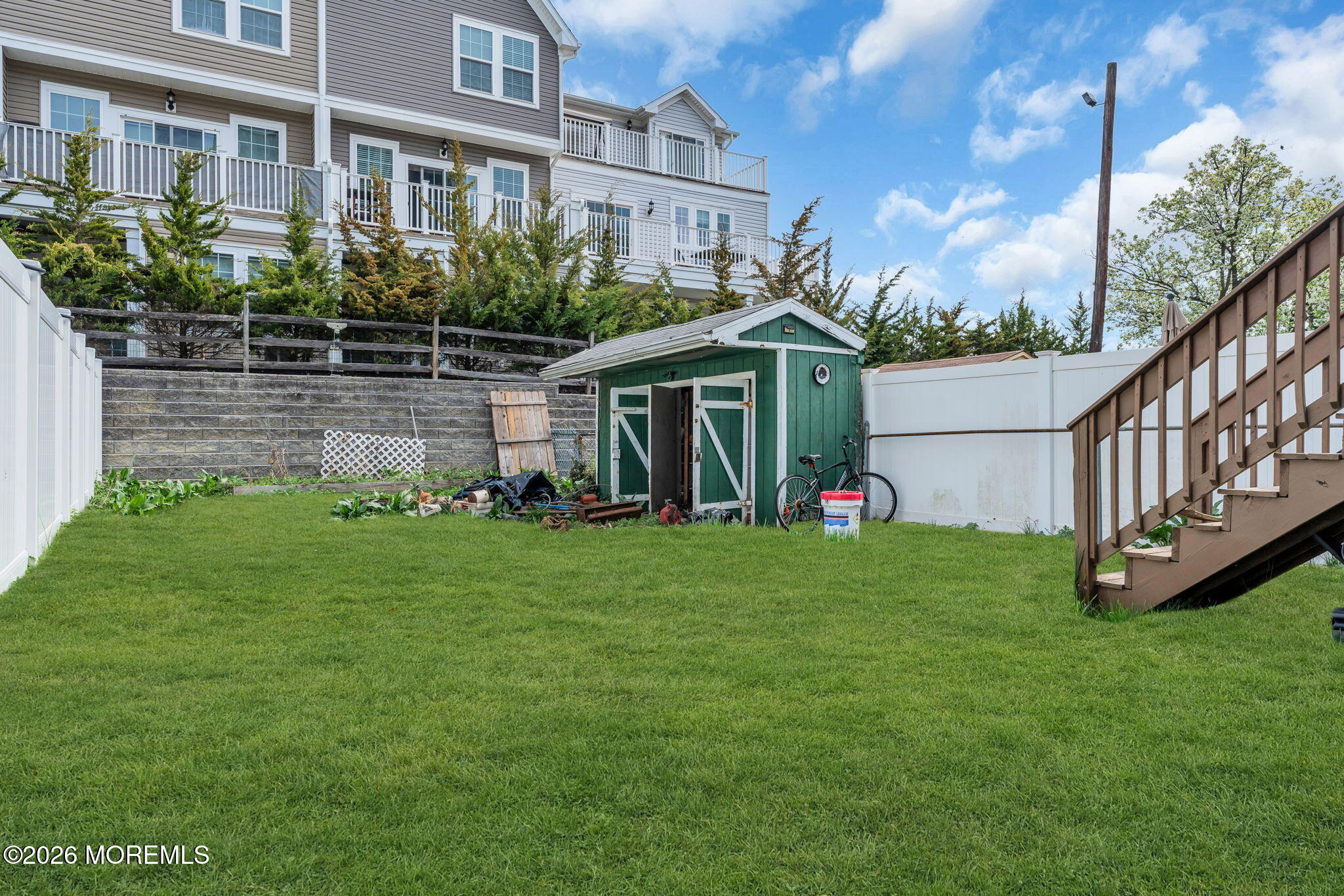 13 Locust Street Highlands, NJ 07732 - Photo 24 of 42 a front view of house with yard and green space