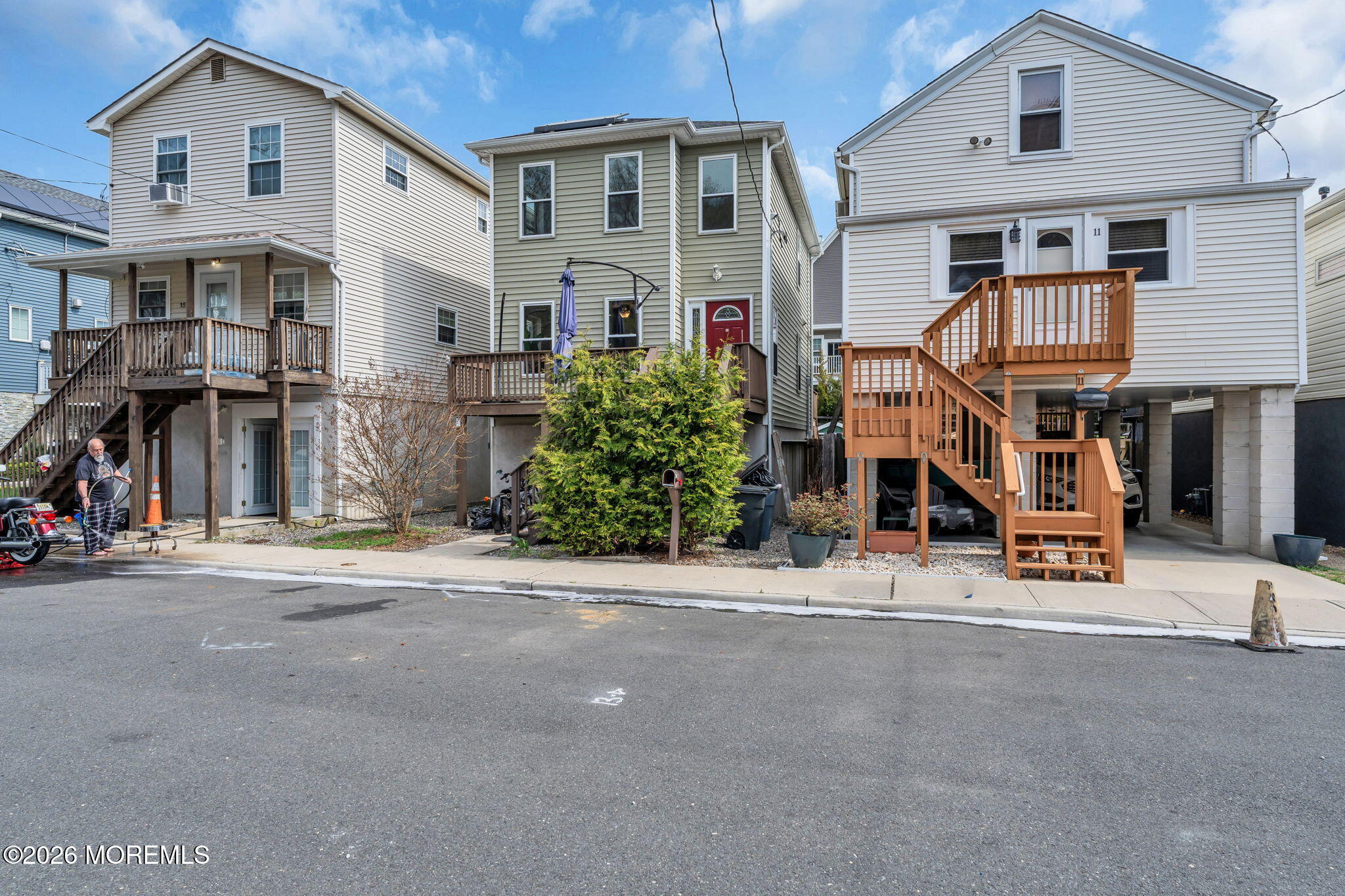 13 Locust Street Highlands, NJ 07732 - Photo 39 of 42 a front view of a house with a garage