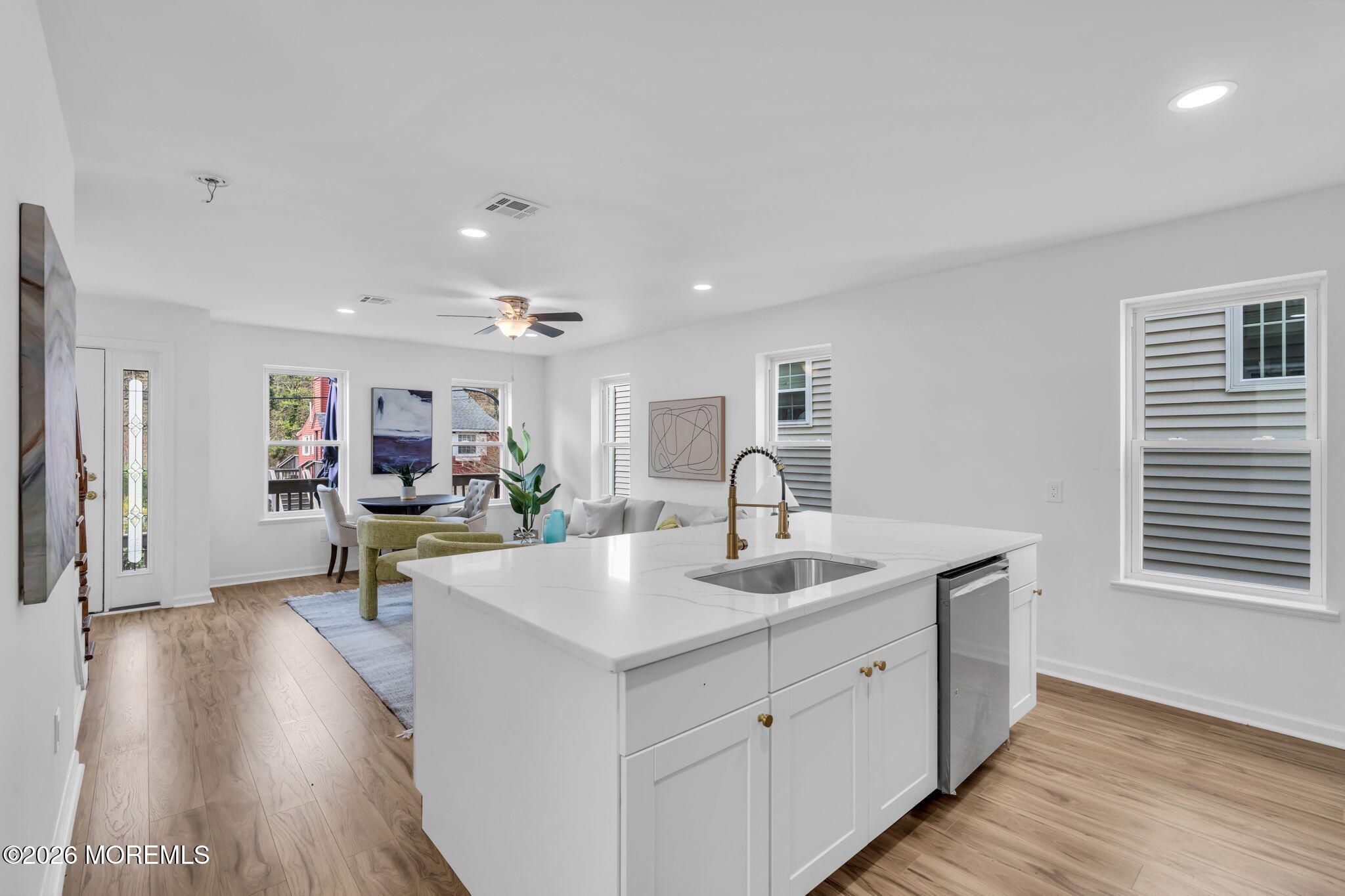 13 Locust Street Highlands, NJ 07732 - Photo 8 of 42 a view of living room with granite countertop furniture and wooden floor