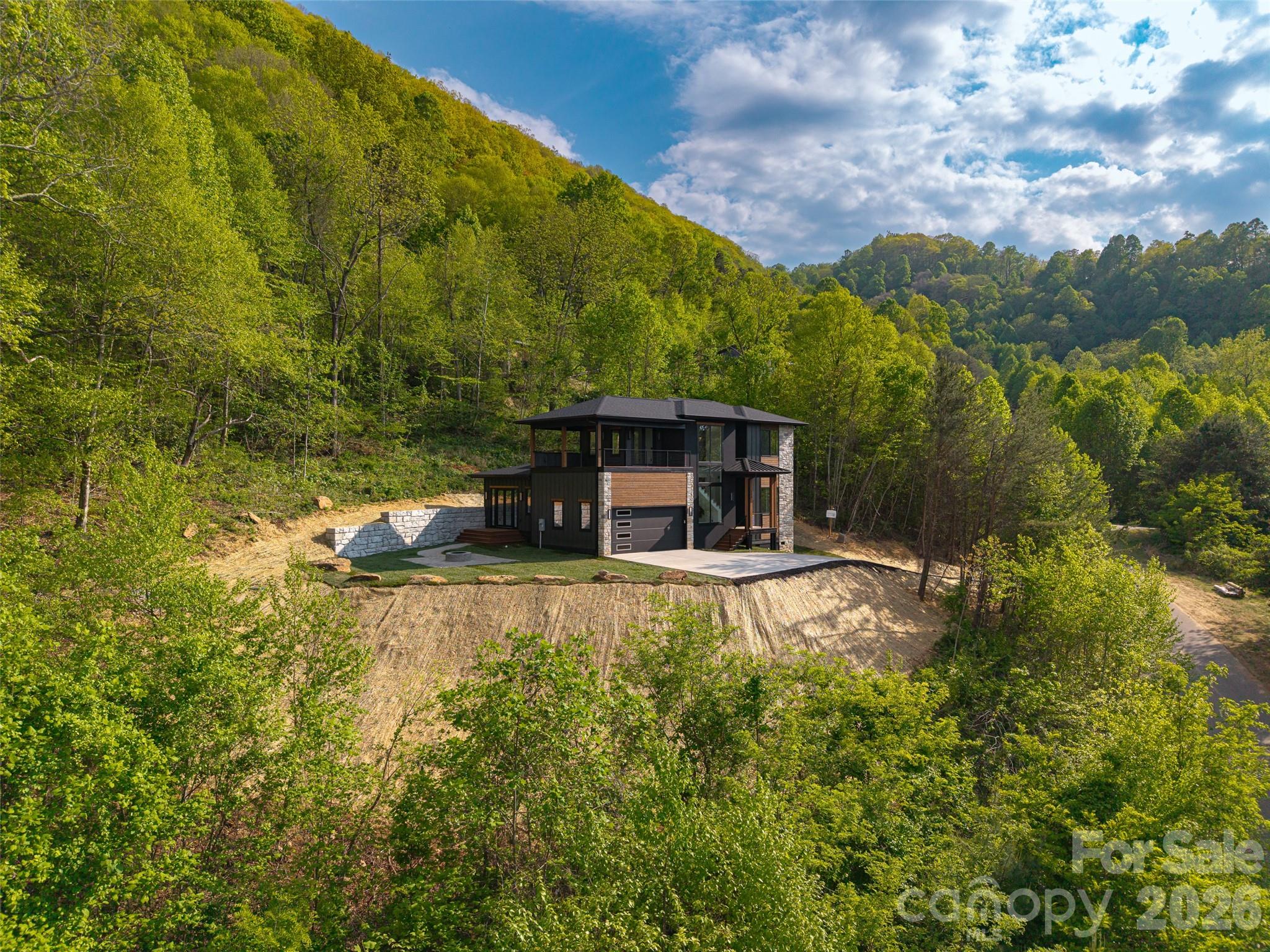 134 View Ridge Parkway Leicester, NC 28748 - Photo 2 of 48 a view of a house with pool and a yard