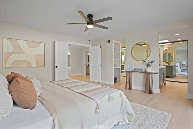 a bathroom with a sink vanity and a mirror