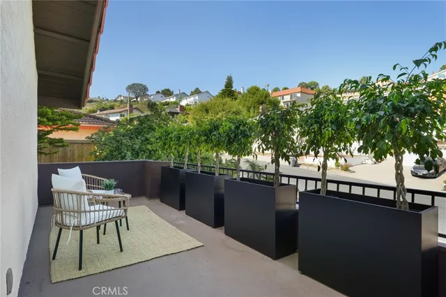 an aerial view of residential houses and outdoor space