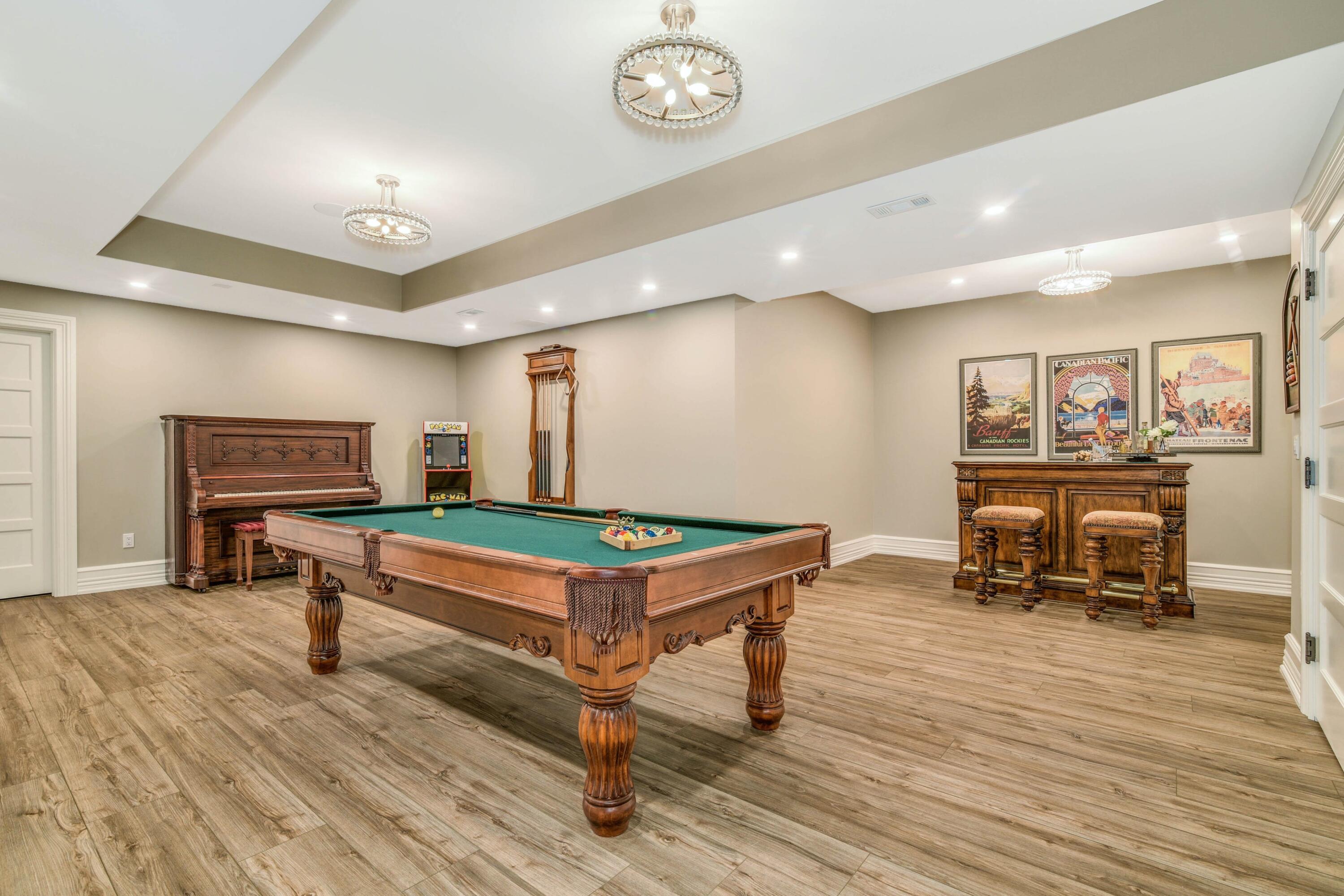 1083 Smith Ridge Road New Canaan, CT 06840 - Photo 29 of 39 a room with furniture and a table