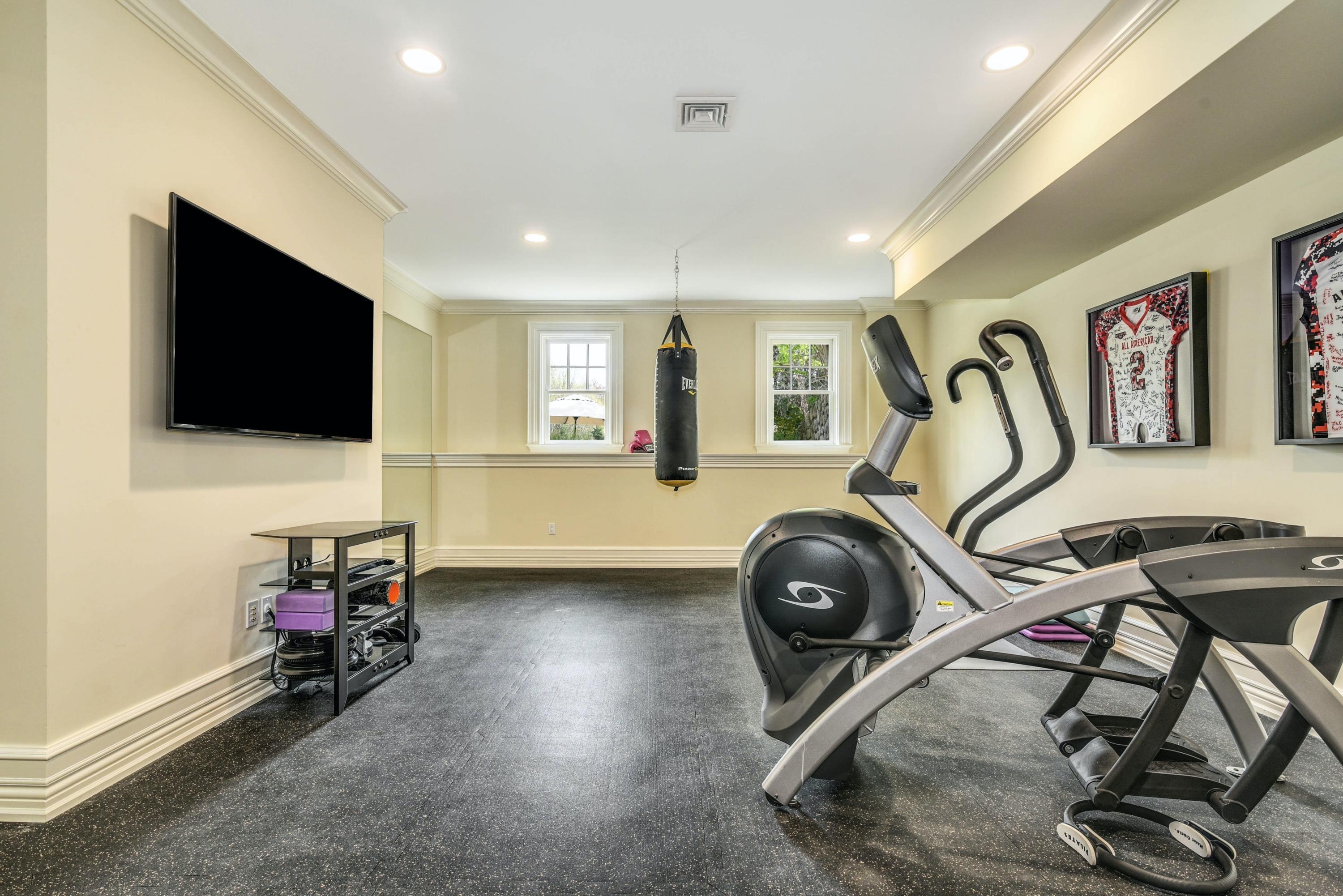 1083 Smith Ridge Road New Canaan, CT 06840 - Photo 31 of 39 a view of a room with gym equipment