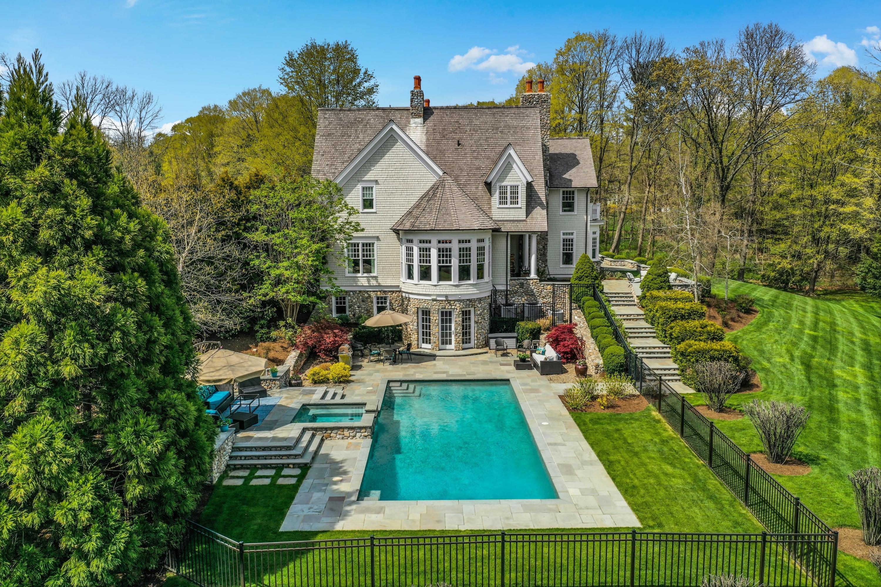 1083 Smith Ridge Road New Canaan, CT 06840 - Photo 35 of 39 an aerial view of a house with swimming pool garden and patio