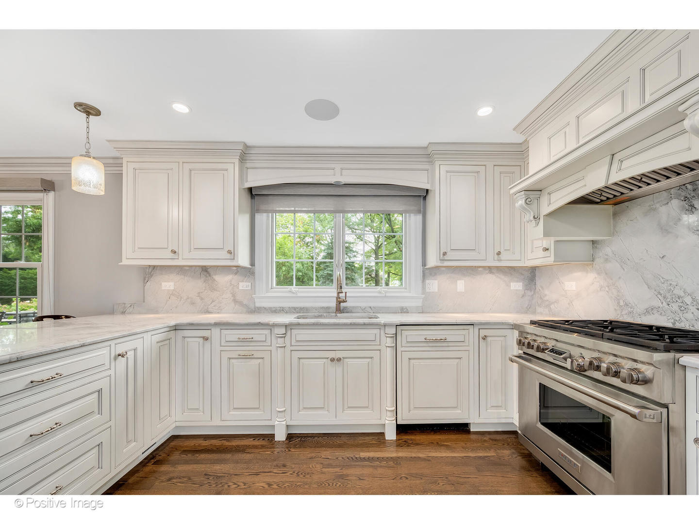 48 Devonshire Drive Oak Brook, IL 60523 - Photo 18 of 59 a kitchen with granite countertop a stove a sink and dishwasher