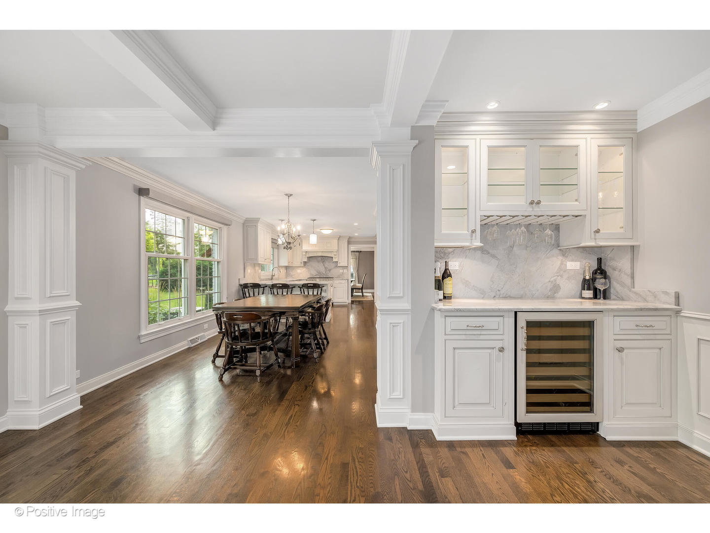 48 Devonshire Drive Oak Brook, IL 60523 - Photo 19 of 59 a kitchen with kitchen island wooden floors and white appliances