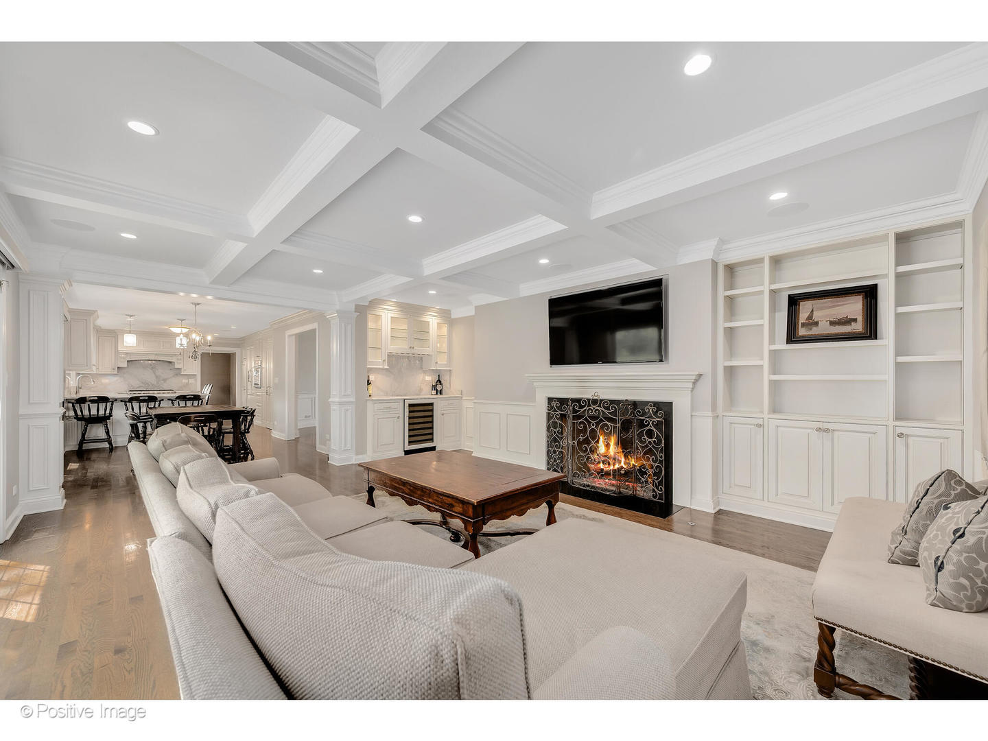 48 Devonshire Drive Oak Brook, IL 60523 - Photo 22 of 59 a living room with furniture a fireplace and a flat screen tv