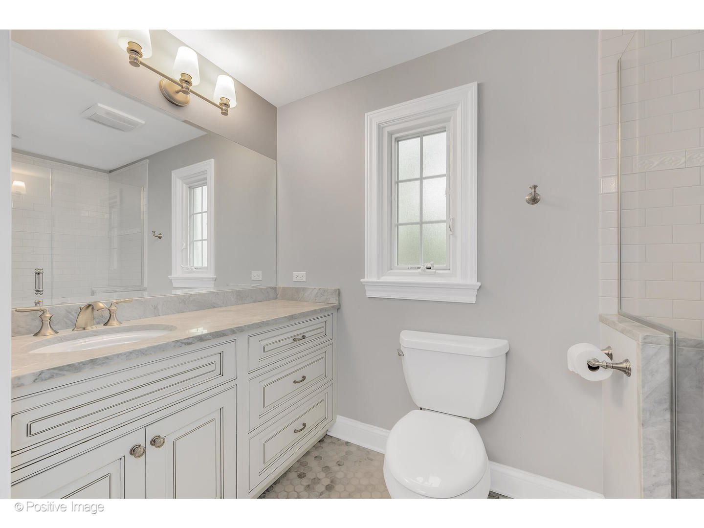 48 Devonshire Drive Oak Brook, IL 60523 - Photo 35 of 59 a bathroom with a granite countertop toilet a sink and a mirror