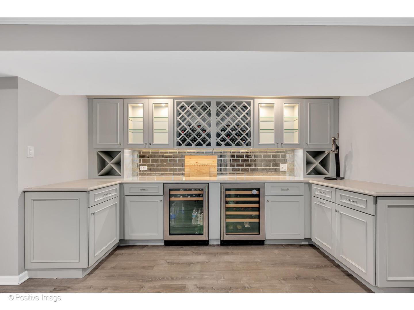 48 Devonshire Drive Oak Brook, IL 60523 - Photo 43 of 59 a kitchen with stainless steel appliances a stove and white cabinets