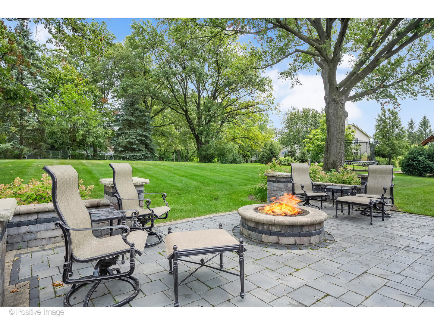 48 Devonshire Drive Oak Brook, IL 60523 - Photo 47 of 59 a view of a patio with a dining table and chairs