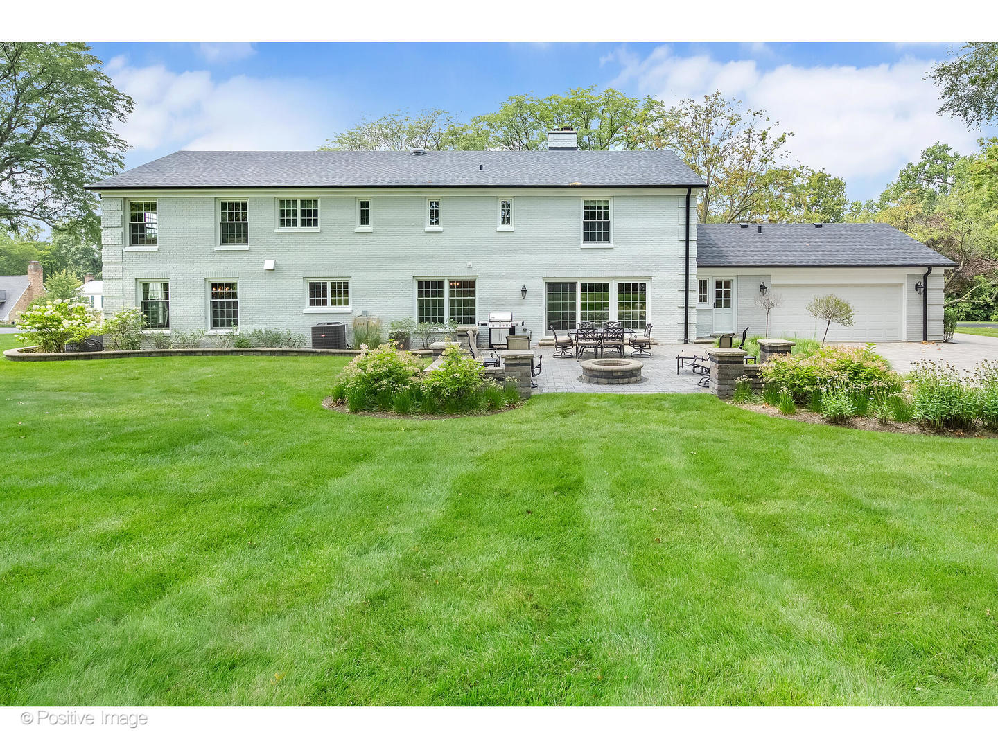 48 Devonshire Drive Oak Brook, IL 60523 - Photo 48 of 59 a view of a house with backyard sitting area and garden