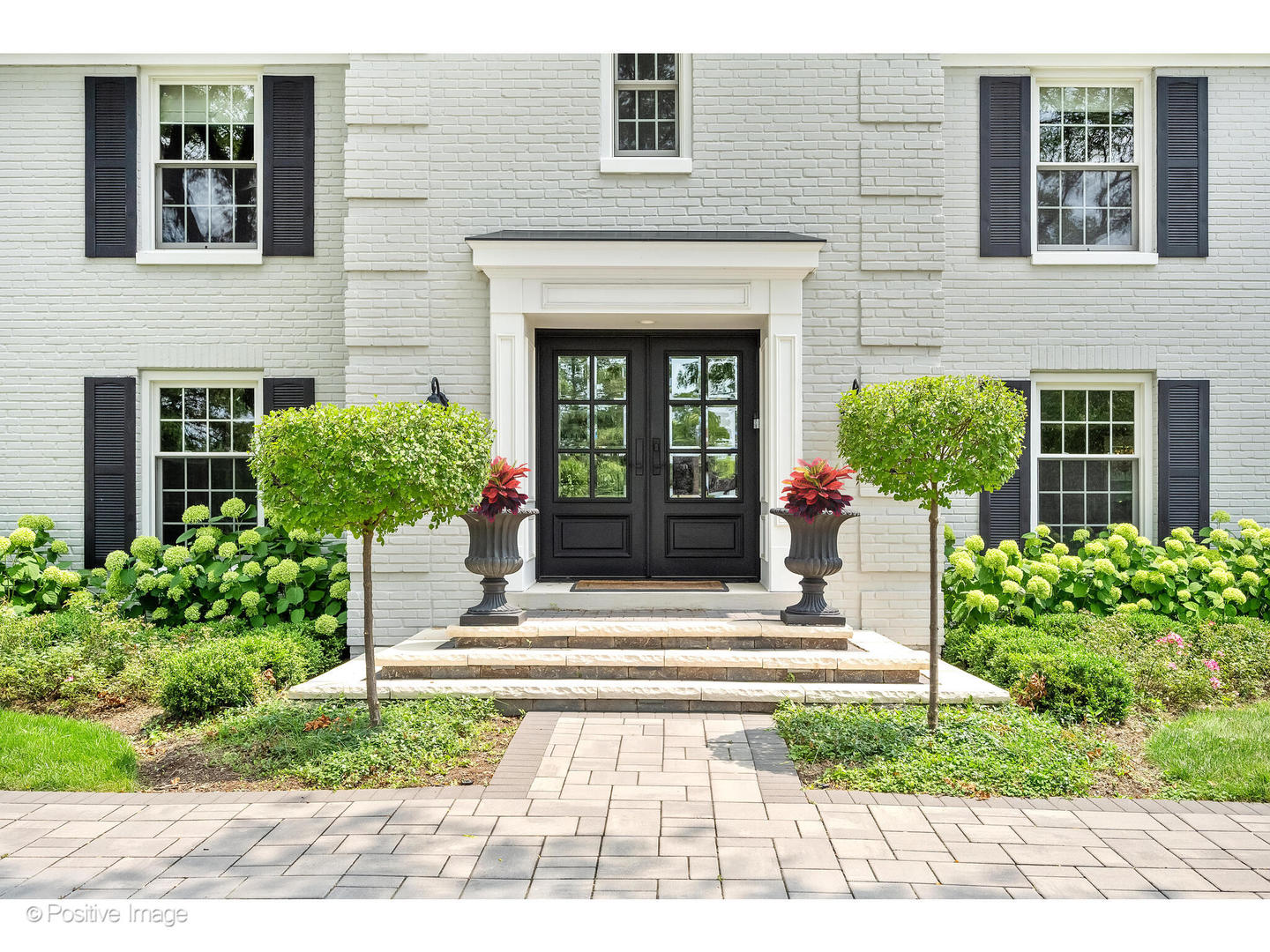 48 Devonshire Drive Oak Brook, IL 60523 - Photo 5 of 59 a house view with a outdoor space