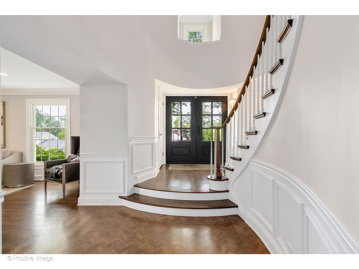 48 Devonshire Drive Oak Brook, IL 60523 - Photo 6 of 59 a view of entryway and hall with wooden floor