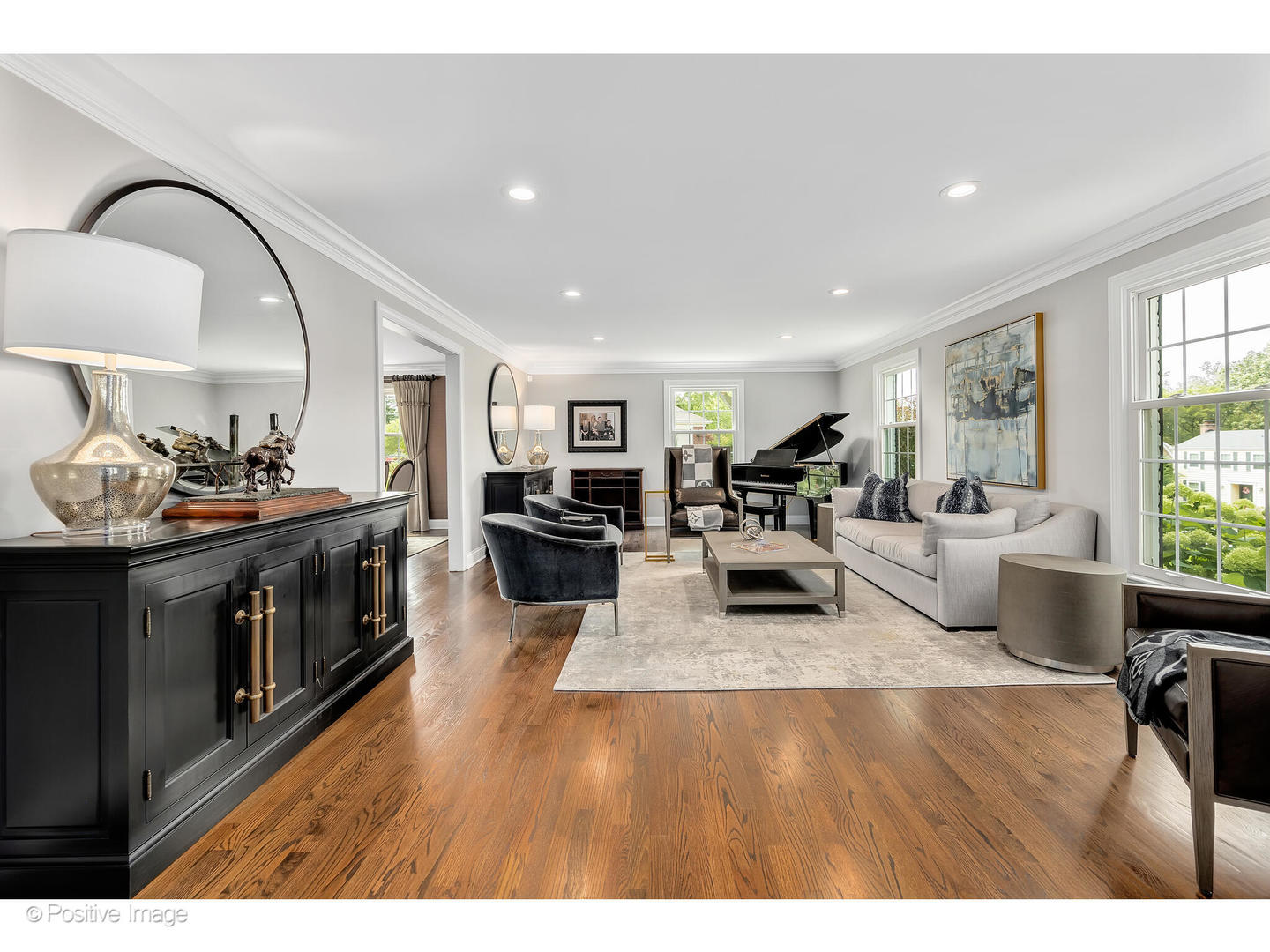 48 Devonshire Drive Oak Brook, IL 60523 - Photo 9 of 59 a living room with furniture and a flat screen tv
