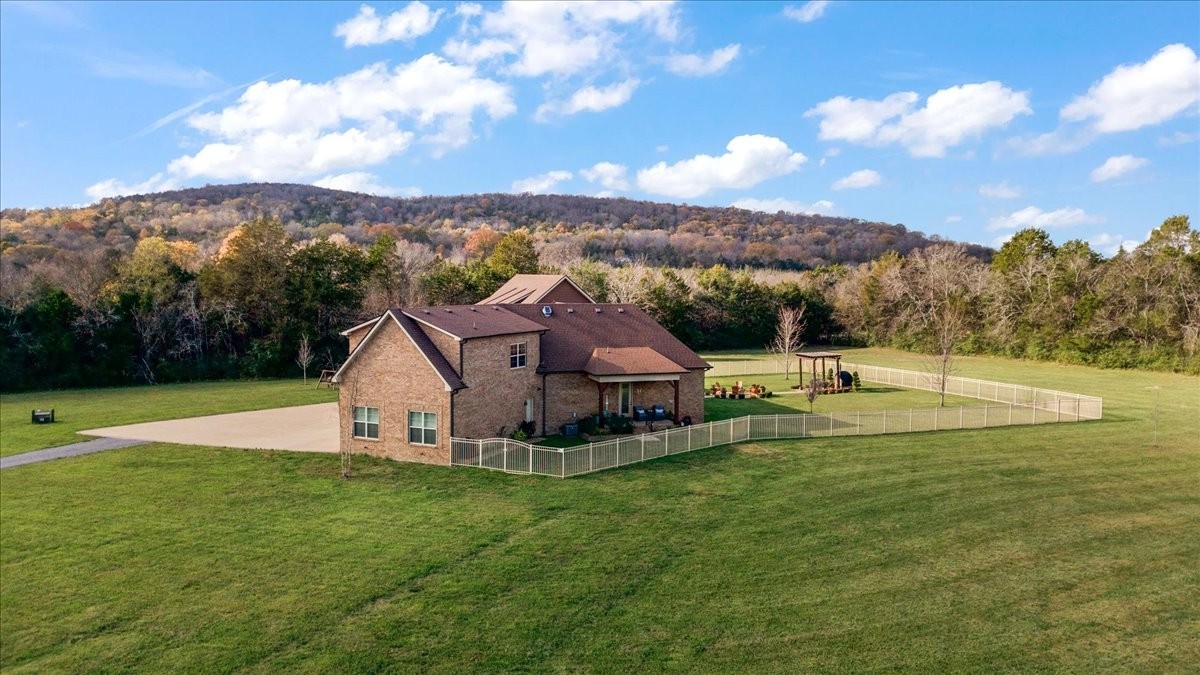12275 Hogwood Road Milton, TN 37118 - Photo 76 of 89 a view of a house with a big yard