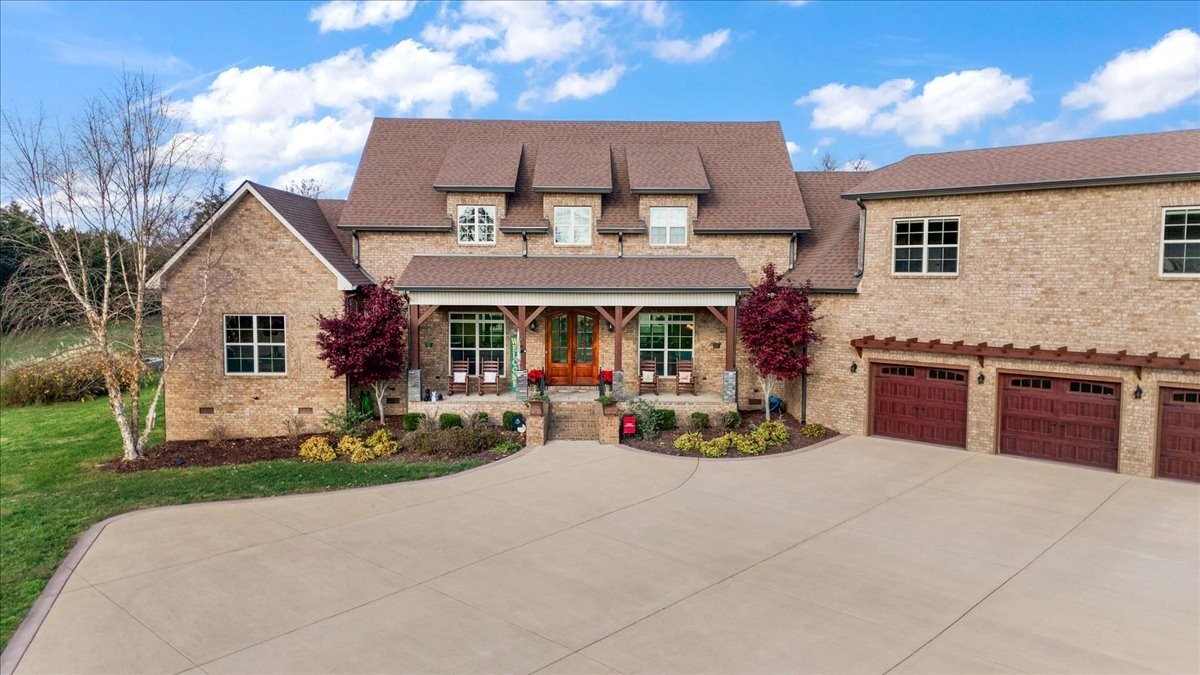 12275 Hogwood Road Milton, TN 37118 - Photo 78 of 89 a view of a house with sitting area and garden