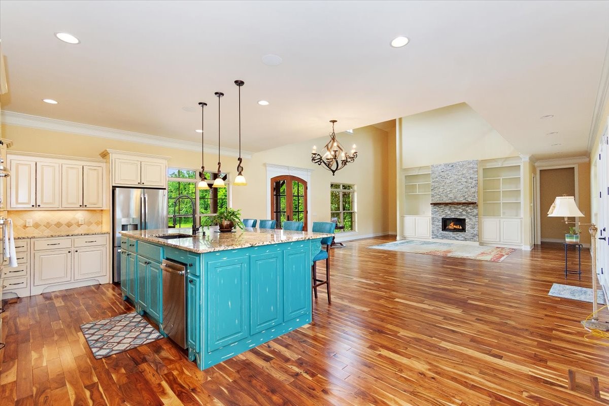 12275 Hogwood Road Milton, TN 37118 - Photo 9 of 89 a kitchen with sink cabinets and wooden floor