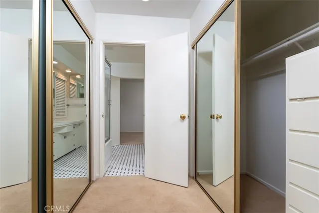 a view of a bathroom from a hallway