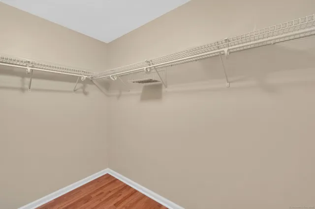 a view of a room with racks on the wall