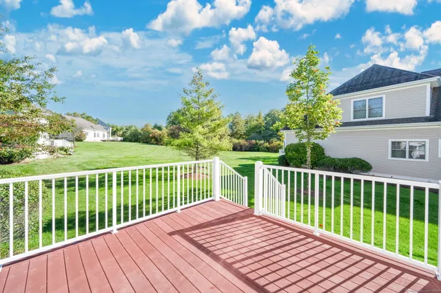 a view of a wooden roof deck
