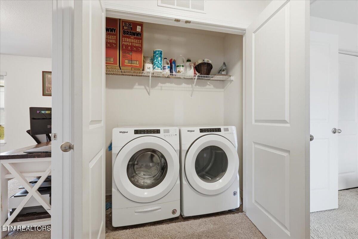 7151 Forest Willow Lane Corryton, TN 37721 - Photo 21 of 24 a utility room with sink dryer and washer