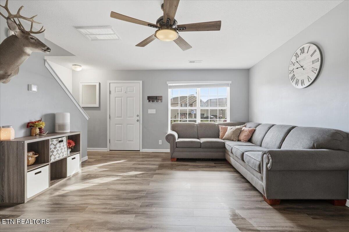 7151 Forest Willow Lane Corryton, TN 37721 - Photo 5 of 24 a living room with furniture and a window