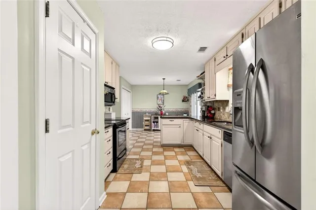 $390,000 | 4009 Courtlin Cove Northwest, Lilburn, GA 30047