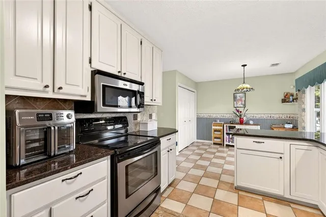 $390,000 | 4009 Courtlin Cove Northwest, Lilburn, GA 30047