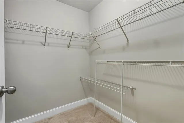 a view of a room with racks on the wall