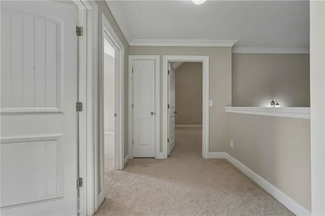 a view of an empty room with a bathroom