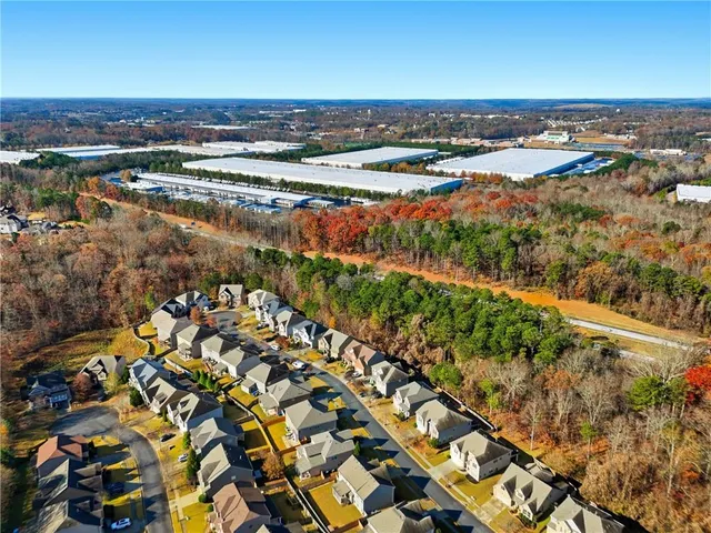 an aerial view of residential building with parking space